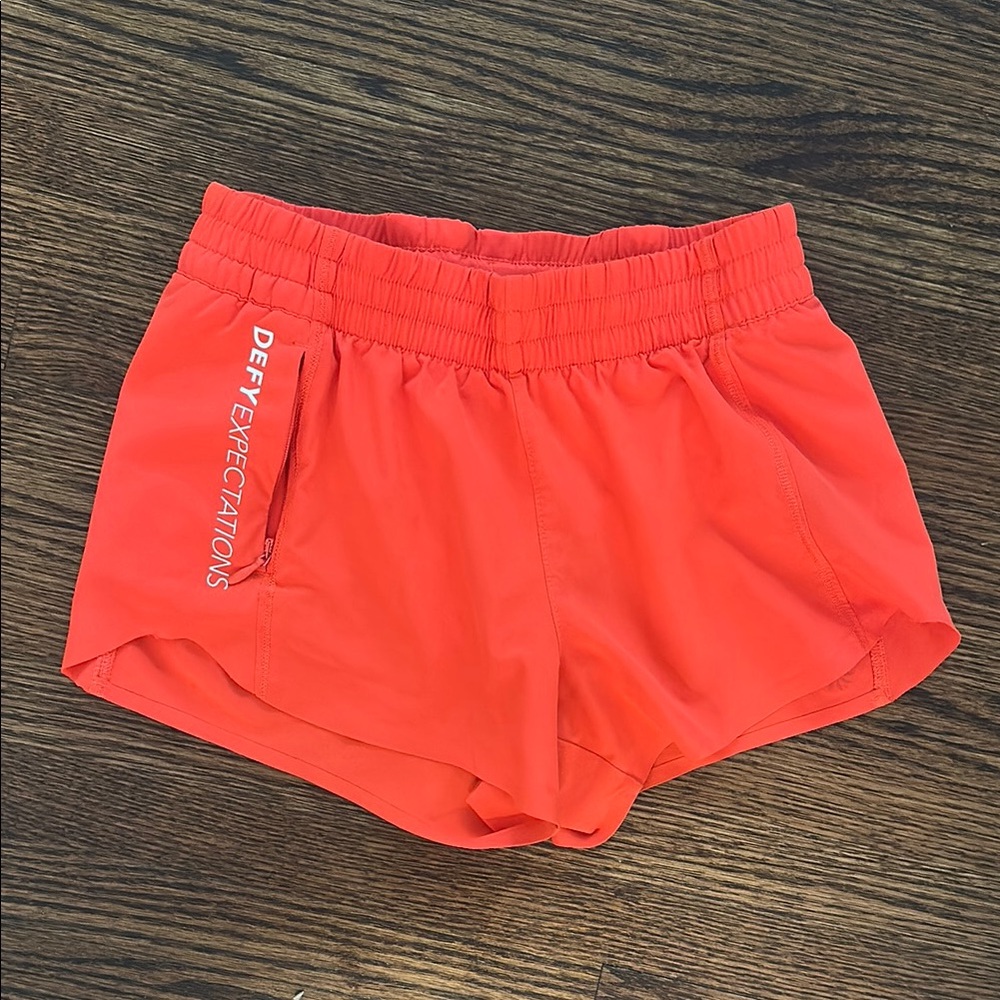 GUC Athleta Girl Orange Shorts size xs/6